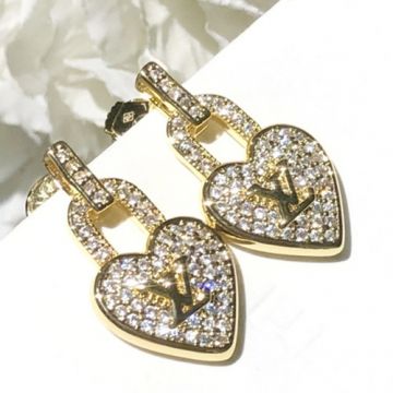 LV earrings - gonna search  till I find the perfect replica :)